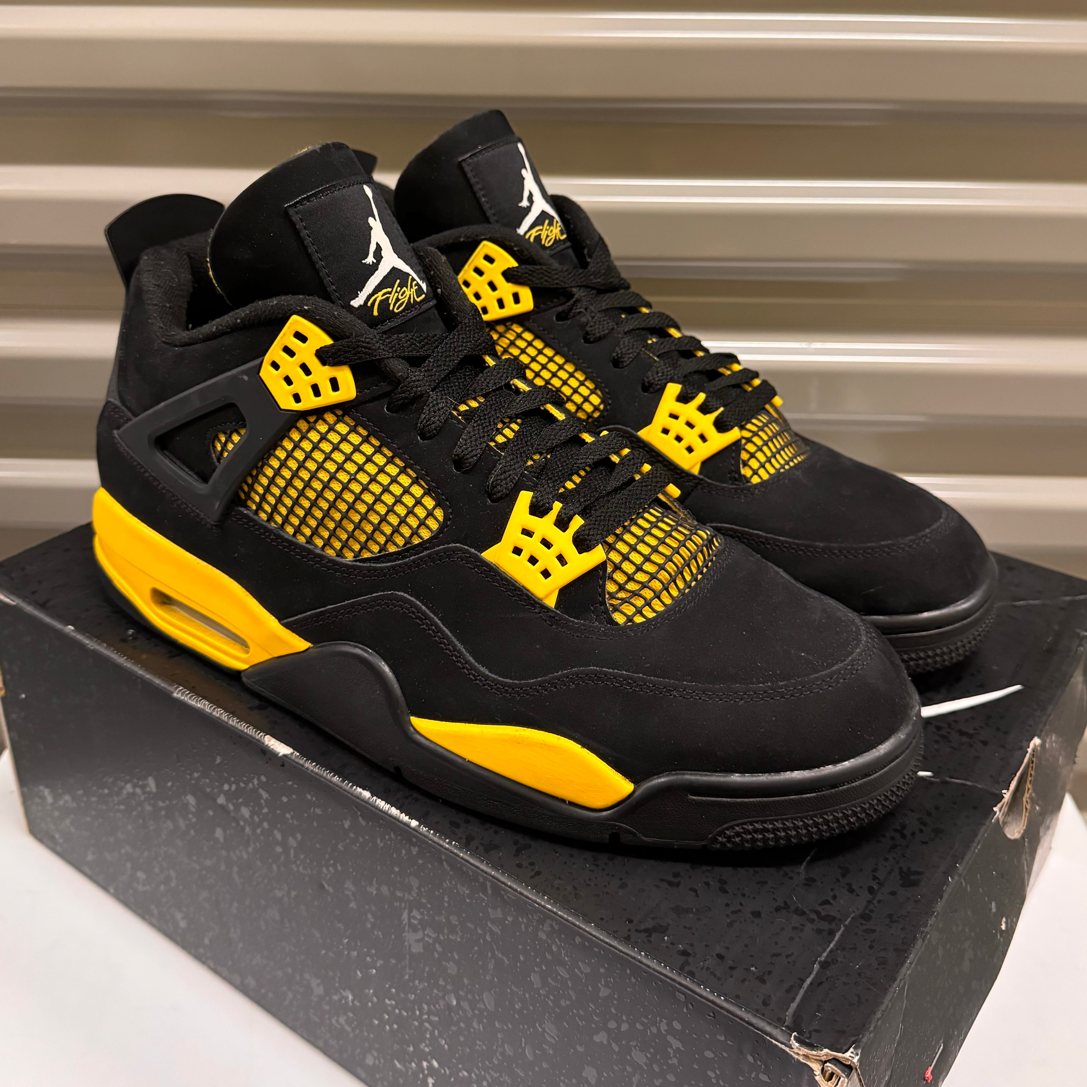 Jordan 4 “Lighting”